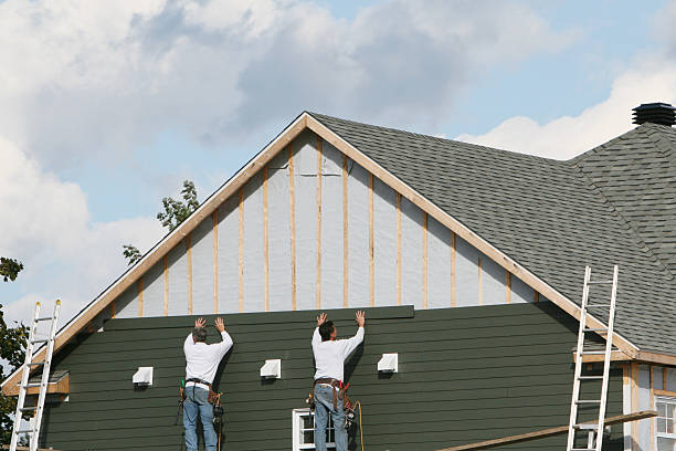 Professional Siding Repair technician working in Greensburg, IN